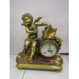 FRENCH MANTEL CLOCK, coloured marble base ormolu mantel clock, with amorini cresting with French
