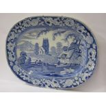 STAFFORDSHIRE POTTERY, blue transfer ware meat plate decorated rural church scene 46cms width