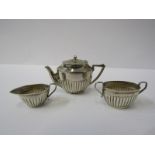 MINIATURE SILVER TEA SET, tea pot, cream and sugar