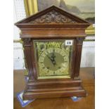 EDWARDIAN CARVED OAK BRACKET CLOCK, architectural design with coiled bar striking movement by