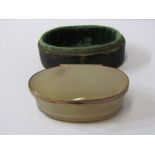 ANTIQUE OVAL ONYX SNUFF BOX, with yellow metal mounts, (tests as gold) with rising lid in fitted