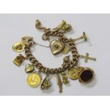 CHARM BRACELET, 9ct gold charm bracelet with various charms to include half sovereign, opening