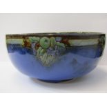 ROYAL DOULTON LAMBETH, blue glazed stoneware deep fruit bowl, decorated with fruit cluster border,