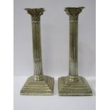 PAIR OF VICTORIAN CORINTHIAN COLUMN SILVER CANDLESTICKS, with fluted support, square form stepped