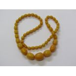 SET OF GRADUATED FAUX AMBER BEADS