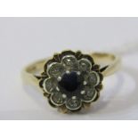 9ct YELLOW GOLD SAPPHIRE & DIAMOND FLOWER STYLE RING, principal brilliant cut sapphire surrounded by