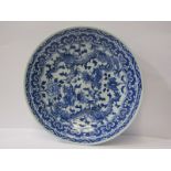 ORIENTAL CERAMICS, underglaze blue twin dragon decorated shallow dish, 31cm diameter