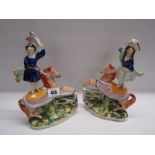 STAFFORDSHIRE POTTERY, pair of 19th Century Staffordshire equestrian acrobat figures (some damage)