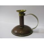 ARTS & CRAFTS, a Dresser-style copper and brass circular base chamber stick, 13cm height