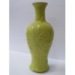 ORIENTAL CERAMICS, mustard glaze inverted baluster 25cm vase with relief village scene decoration