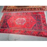 TURCOMAN MEDALLION CENTRE RED GROUND RUG