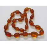 AMBER BEADS, string of graduated amber beads, 28" length, 115 grams