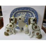 STAFFORDSHIRE POTTERY, pair of 19th Century lustre seated spaniels, 22cm height (firing faults);