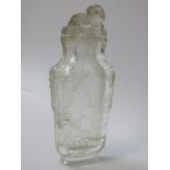 ORIENTAL ROCK CRYSTAL, a carved rock crystal bottle with demon dog cover, decorated with cottage