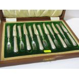 FRUIT EATERS, walnut cased set of 6 pairs of silver handled fruit eaters, assay marks rubbed