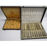 SILVER TEA KNIVES, cased set of 12 ornate handled silver tea knives, together with boxed gilded
