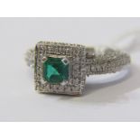 IMPRESSIVE EMERALD & DIAMOND CLUSTER RING, 14ct white gold ring set a square form cushion cut