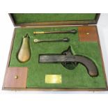 ANTIQUE FIRE ARM, early Victorian percussion twin barrel pistol with swivel action barrels, with