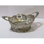 CONTINENTAL SILVER SWEET MEAT BASKET, an ornate pierced and embossed oval sweet meat basket with