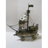 CONTINENTAL SILVER GALLEON NEF, single masted boat on 4 wheel base and detached hull, decorated with
