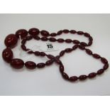 CHERRY AMBER BEAD NECKLACE, 28" graduated cherry bead necklace, largest bead approx. 3cm, 52 grams