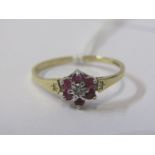 RUBY & DIAMOND CLUSTER RING, 9ct gold ring, set a central diamond, surrounded by a cluster of 6