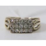 YELLOW METAL TESTED 14CT GOLD DIAMOND CLUSTER RING, 15 bright brilliant cut diamonds totaling