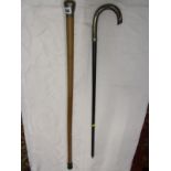 ANTIQUE WALKING STICKS, white metal handled ebony walking stick and silver capped walking stick