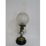 ANTIQUE OIL LAMP, embossed brass circular oil lamp with cut glass reservoir and acid etched