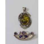 2 SILVER ITEMS, 1 amber floral style pendant and 1 amethyst brooch
