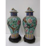 ORIENTAL CERAMICS, pair of Chinese famille rose inverted baluster lidded vases 35cms, decorated with