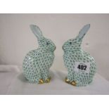 HEREND, pair of green enamel seated Hares, 14cm height