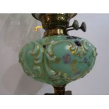 DECORATIVE OIL LAMP, green onyx column base with painted milk glass reservoir and green glass
