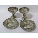 PAIR OF SILVER SWEET MEAT DISHES, Continental silver tripod base sweet meat dishes embossed with