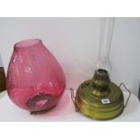 BRASS BASED OIL LAMP, together with cranberry glass oil lamp shade