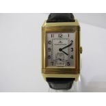 18CT YELLOW GOLD JAEGER-LECOULTRE REVERSO WRIST WATCH, on leather strap with original Jaeger