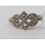 9ct YELLOW GOLD DIAMOND SET CELTIC KNOT DESIGN RING, size O/P