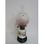 ANTIQUE OIL LAMP, rose painted reservoir table lamp with cranberry glass frosted spherical shade