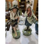 AUSTRIAN POTTERY, pair of Austrian child figures "Hunter" and "Fish Seller", 57cm height