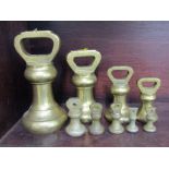 ANTIQUE SCALE WEIGHTS, a graduated collection of 9 pear shaped brass weights, mainly by Avery,