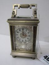 MINIATURE CARRIAGE CLOCK by Brequet in ornate silvered case, 8.5cm height