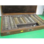 VINTAGE OPTICIANS, oak cabinet cased display of testing lenses, 54cm width