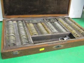 VINTAGE OPTICIANS, oak cabinet cased display of testing lenses, 54cm width