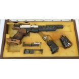 FEINWERKBAU c55 MULTISHOT MATCH PISTOL, with box and accessories, very rare. As chosen by George