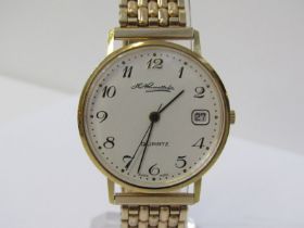 GOLD CASED QUARTZ WRIST WATCH with inscription to W J Hoare, in recognition to Long Service in ECC