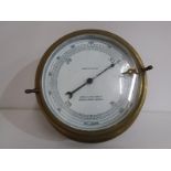 MARITIME, a brass cylindrical case compensated barometer by John Lilley & Son, 18cm diameter