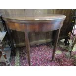 SHERATON MAHOGANY DEMI-LUNE FOLD TOP CARD TABLE, inlaid edging and tapering square section legs,