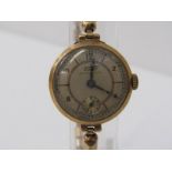 VINTAGE 9ct YELLOW GOLD CASED WRIST WATCH by Tissot, untested condition on expanding gold plated