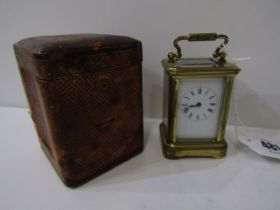 MINIATURE BRASS CASED CARRIAGE CLOCK, bevel glass panels, together with antique carry case, 8cm