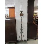 ANTIQUE METALWARE, Art Nouveau wrought iron and copper telescopic oil lamp stand with lamp